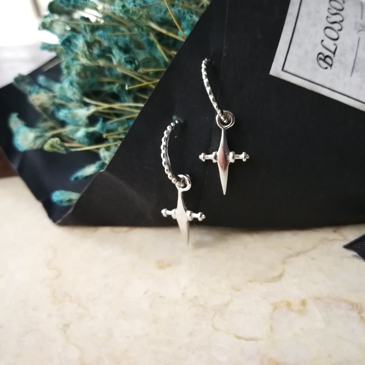 Crossed earrings